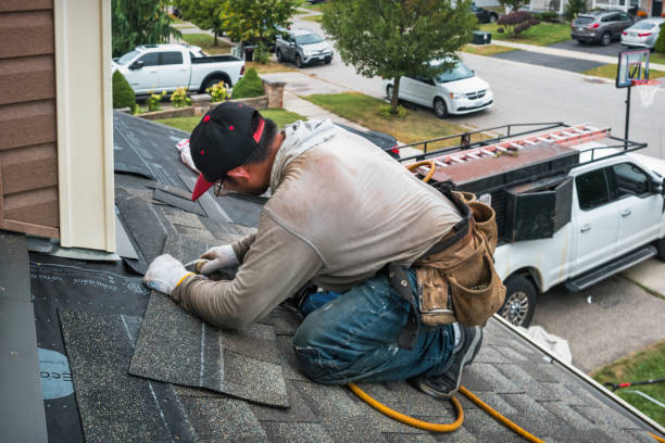 Professional Roofing technician working in East Troy, WI